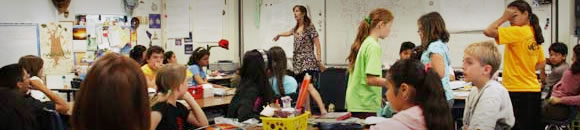 children and teacher in classroom